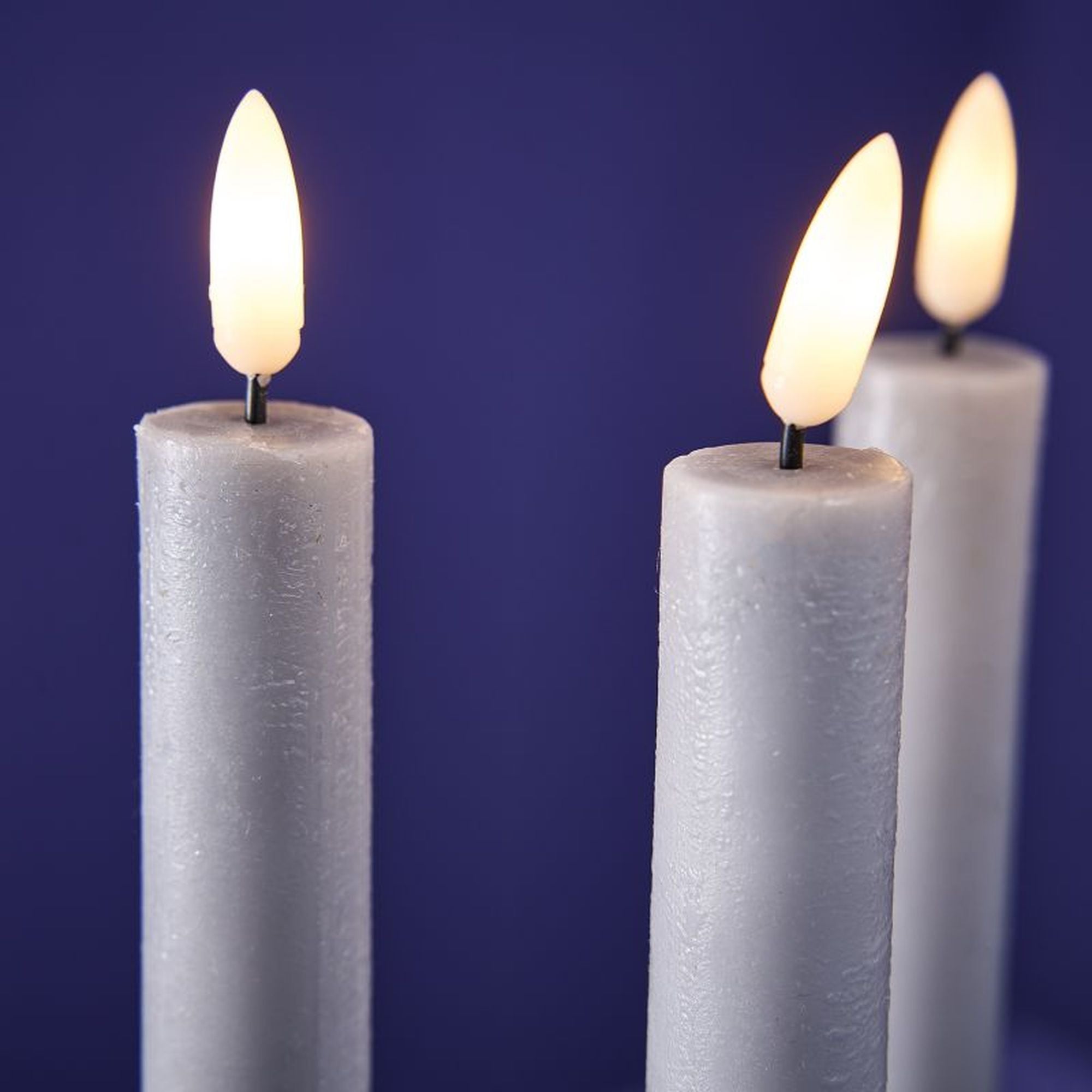 Set 4-teilig - LED Stabkerze - Echtwachs/Kunststoff/LED - H. 24.5 cm - m. Fernbedienung